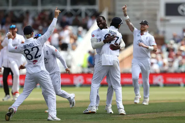 England celebrating a wicket