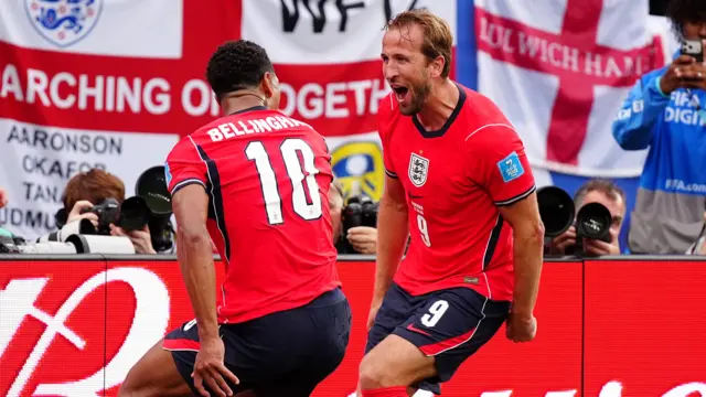 Harry Kane celebrates with Jude Bellingham