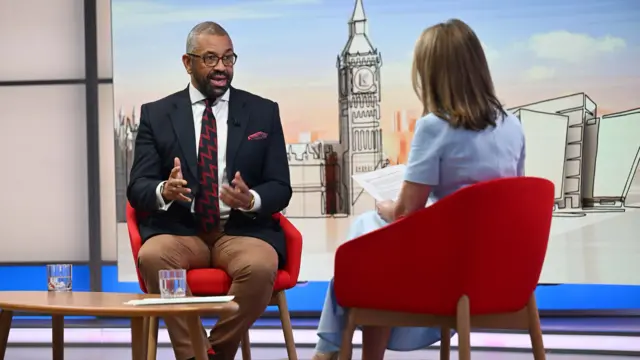 James Cleverly sits on a chair opposite Victoria Derbyshire