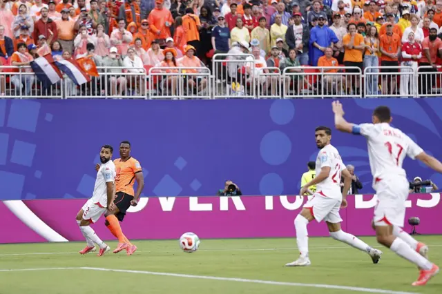Tunisia midfielder Ellyes Skhiri inadvertently scores an own goal during his side’s World Cup group-stage match against the Netherlands