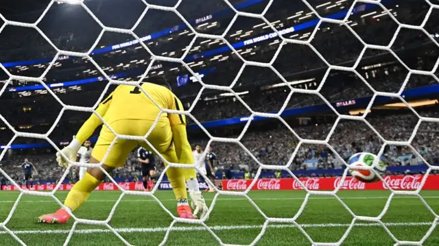 Yazeed Abulaila concedes a free-kick goal scored by Lionel Messi