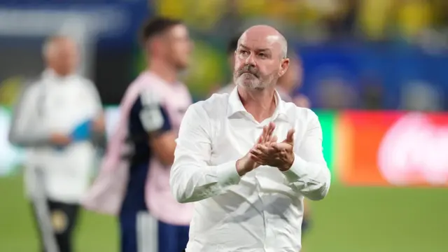 Steve Clarke claps the Scotland fans