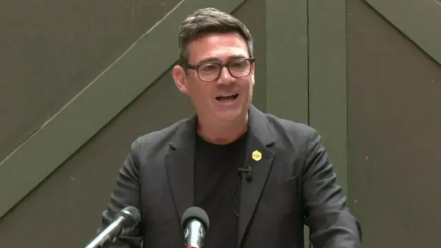 Burnham giving speech