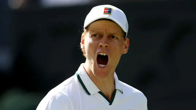 Jannik Sinner of Italy celebrates a point