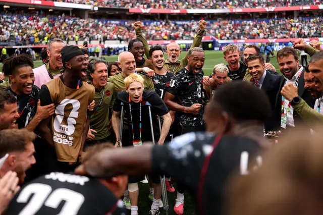 Ismael Kone, left, celebrates with team-mates