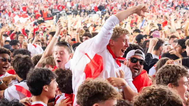 Fans cheer on Canada and the winning goal versus South Africa in the round of 32 match at the Vancouver FanFestival