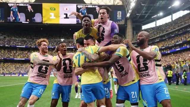Gabriel Martinelli #22 of Brazil celebrates with teammates after scoring the team's second goal during the FIFA World Cup 2026 Round Of 32 match between Brazil and Japan.
