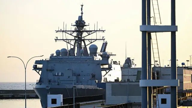 The USS Fort Lauderdale is docked in the port of La Guaira on 29 June
