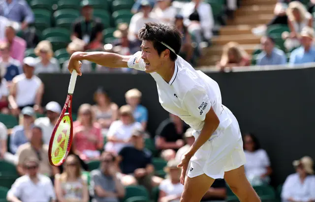 Michael Zheng of United States serves
