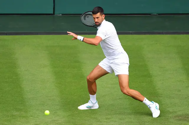 Novak Djokovic hits a forehand