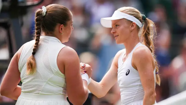 Jelena Ostapenko celebrates winning her first round match against Harriet Dart