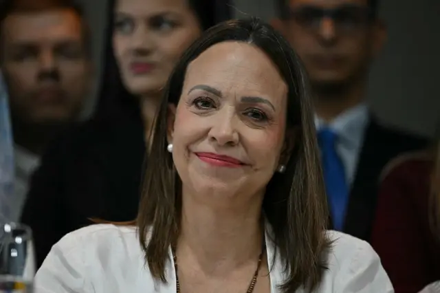 Maria Corina Machado smiling at the camera