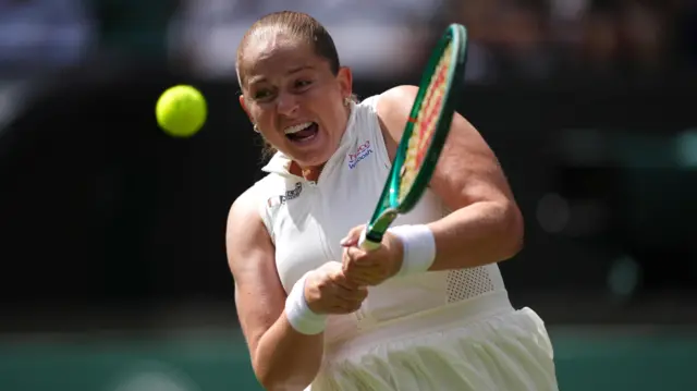 Jelena Ostapenko plays a backhand