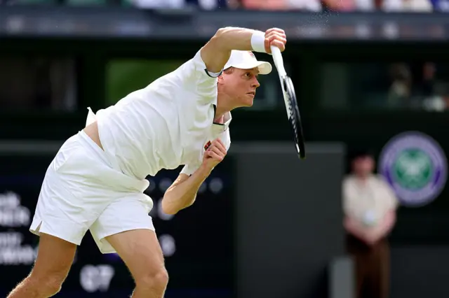 Jannik Sinner of Italy serves