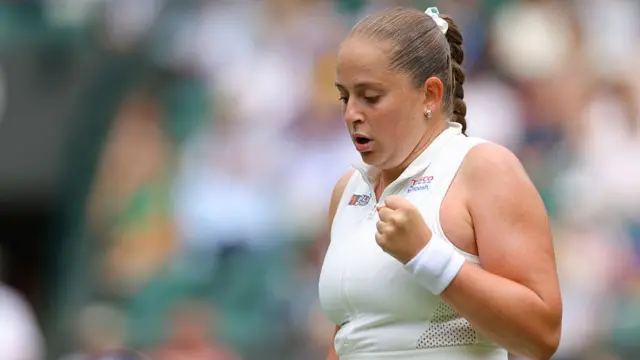 Jelena Ostapenko celebrates as she breaks back
