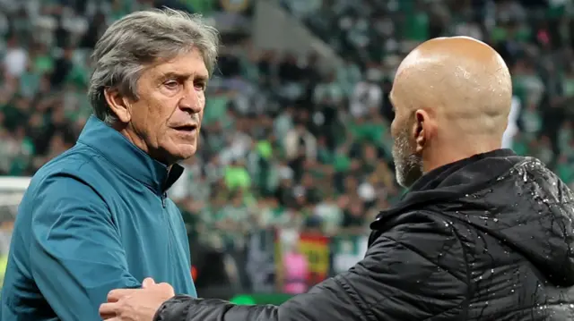 Manuel Pellegrini and Enzo Maresca embrace at the Conference League final