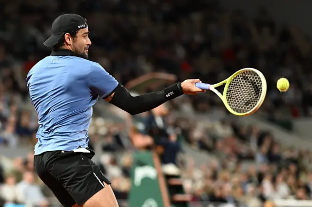 Matteo Berrettini of Italy plays the ball