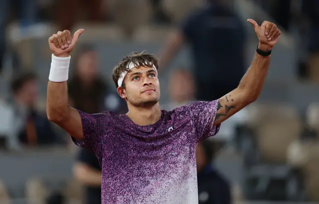Flavio Cobolli of Italy celebrates