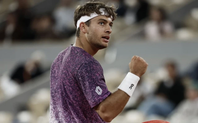 Italy's Flavio Cobolli reacts