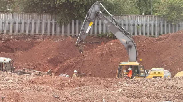 A large vehicle on what could be a building site