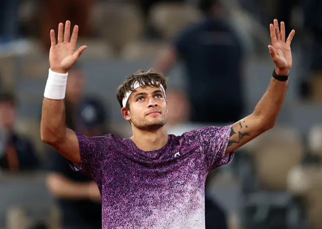 Flavio Cobolli of Italy celebrates victory over Felix Auger-Aliassime of Canada