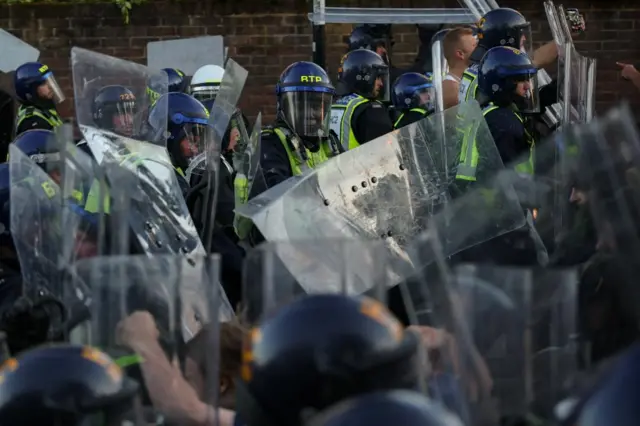Officsers with riot shields