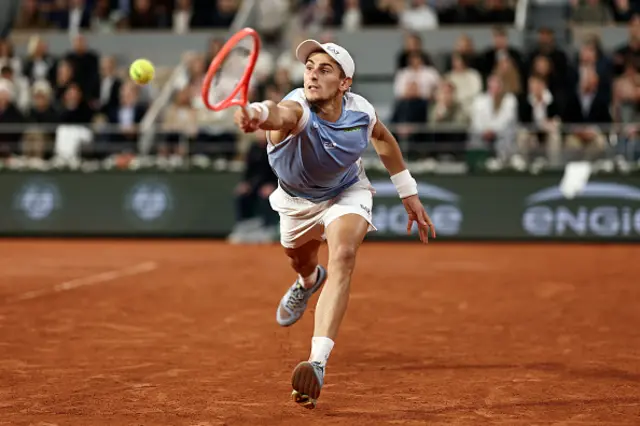 Matteo Arnaldi of Italy plays a backhand