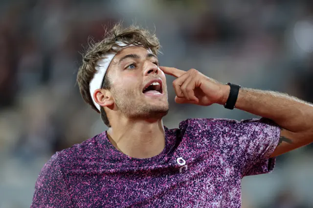 Flavio Cobolli of Italy reacts
