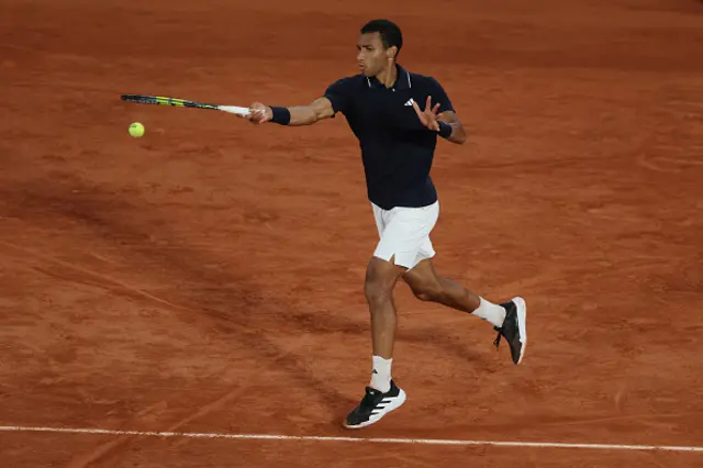 Felix Auger-Aliassime of Canada plays a forehand