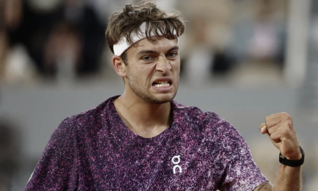 Italy's Flavio Cobolli reacts