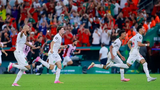 Morocco players react