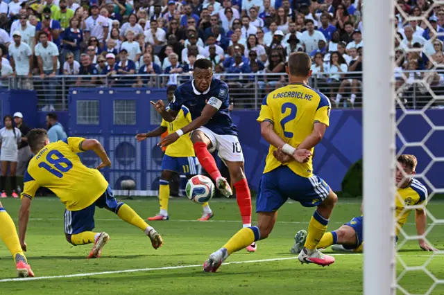 Mbappe shoots and scores