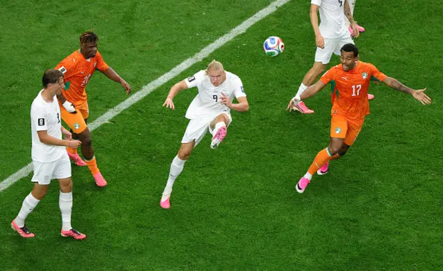 Erling Haaland of Norway clears the ball