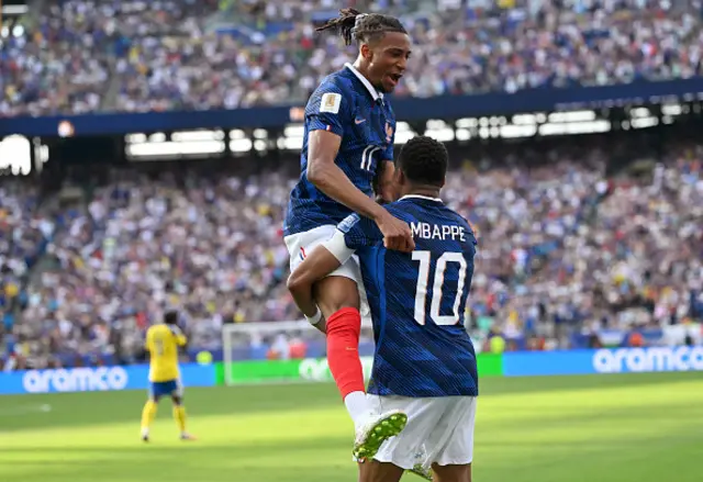 Kylian Mbappe celebrates scoring