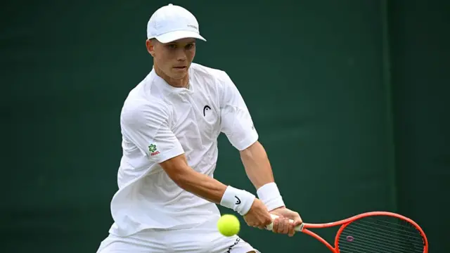 Harry Wendelken hits a backhand