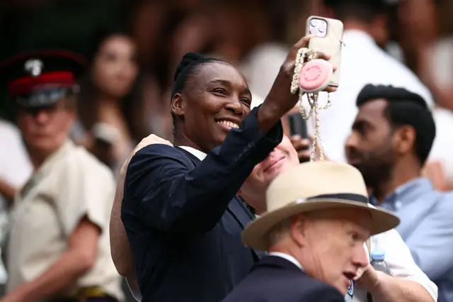 Venus Williams poses for a photo