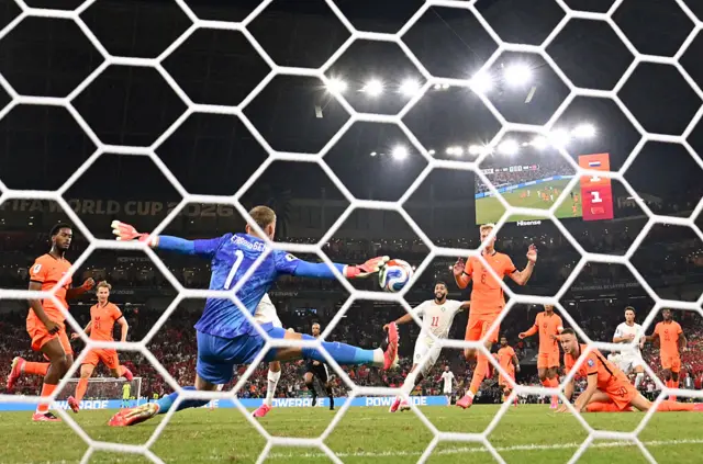Netherlands goalkeeper Bart Verbruggen makes a save in extra time