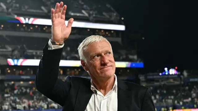 France's head coach Didier Deschamps waves to fans