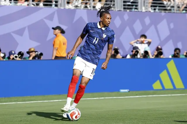 Michael Olise on the ball