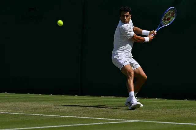 Jaume Munar plays a return shot