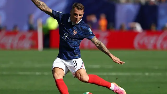 France's defender #03 Lucas Digne shoots during the 2026 World Cup round of 32 football match between France and Sweden.