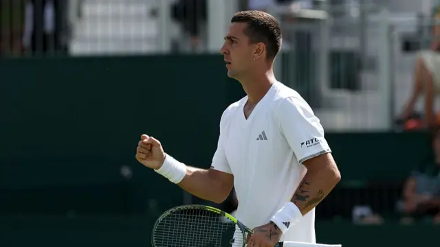 Thanasi Kokkinakis of Australia celebrates winning the third set