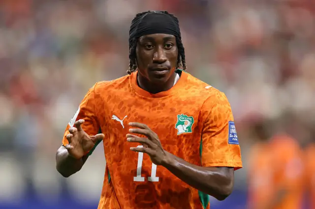 Yan Diomande #11 of Cote d'Ivoire looks on