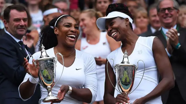 Serena Williams and Venus Williams celebrating