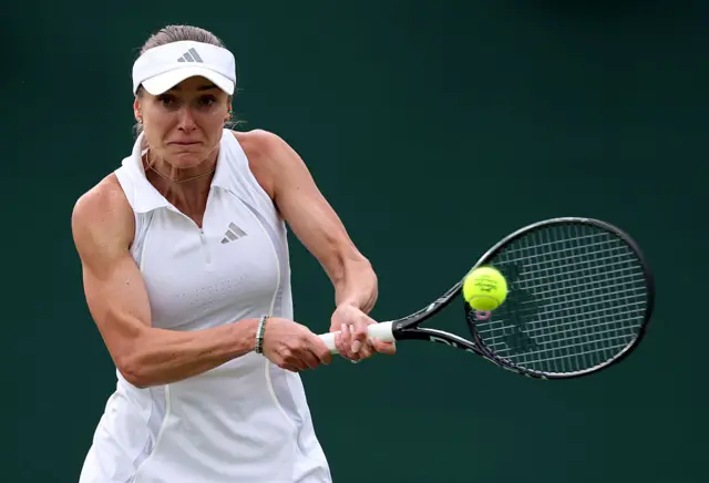 lina Svitolina of Ukraine plays a backhand