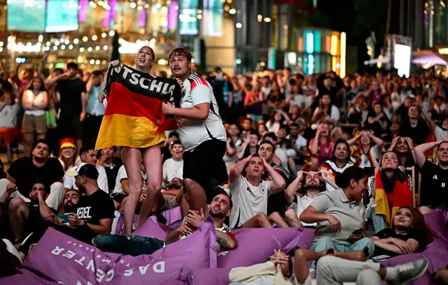 Germany fans watch in horror
