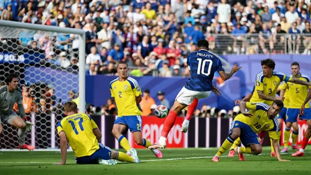 Kylian Mbappe #10 of France scores his team's first goal during the FIFA World Cup 2026 Round Of 32 match between France and Sweden