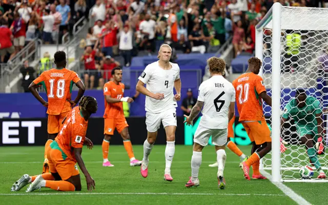 Erling Haaland #9 of Norway celebrates with Patrick Berg