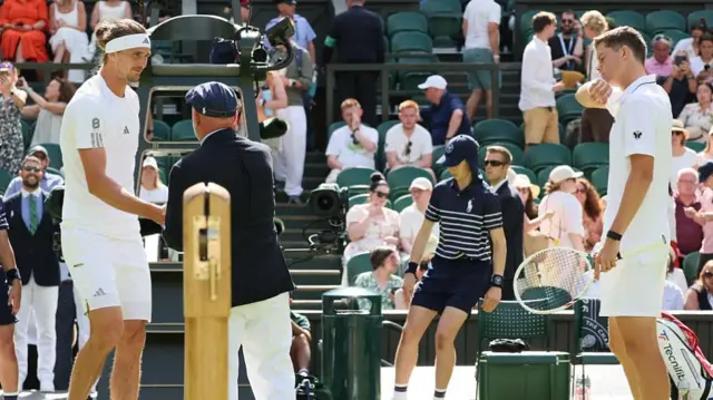 Alexander Zverev and Alexander Blockx at the coin toss