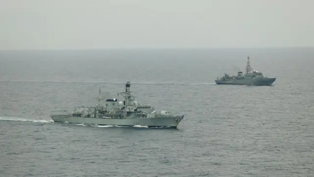 Undated handout photo issued by Ministry of Defence of HMS Somerset with the Yury Ivanov, Russian Navy intelligence-gathering ship. The Royal Navy has said it has carried out a three-month long "unbroken watch" on Russian warships and accompanying vessels in and around UK water including a frigate which fired a warning shot on a British yacht. Issue date: Friday June 26, 2026